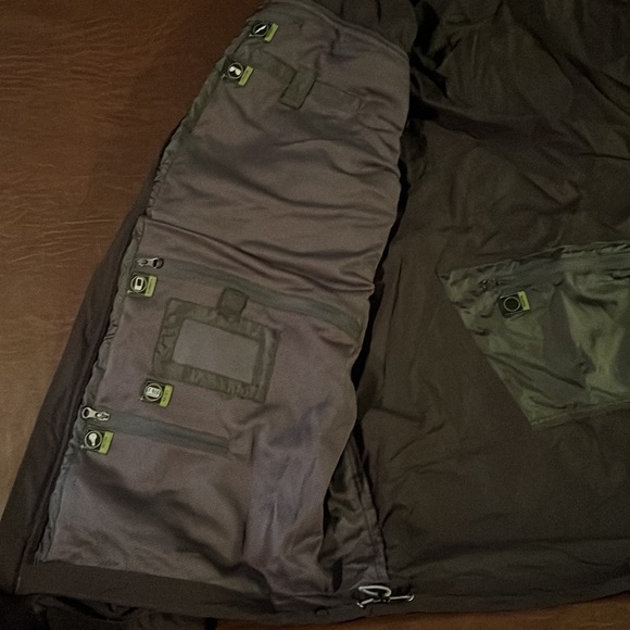 XL brownish ExOfficio coat with an unbelievable amount of pockets. - Picture 3 of 5